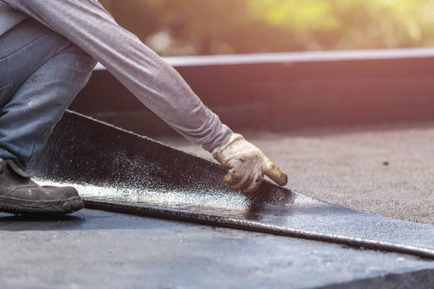 Professional Emergency Waterproofing technician working in Kings Park, NY